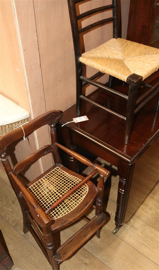A late Victorian stained beech childs high chair and a childs rush seated ebonised chair